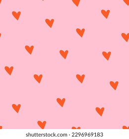 Seamless pattern with red hearts on pink backdrop. Cute doodle style hearts. Valentine's Day. Ideal for a holiday, baby shower, birthday, wrappers, prints, clothes, cards, banner, textiles. Kawaii