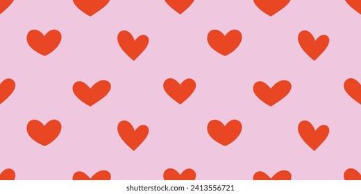Seamless pattern with red hearts. Red hearts on pink background. 
