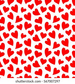 Seamless pattern with red hearts on the white background for printing on Saint Valentine's Day cards, on fabric or clothes.