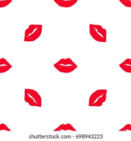 Seamless pattern with red kisses on white background. Can be used for design of wrapping paper,textile, blog decoration, banner, poster,or romantic greeting card.Vector illustration.