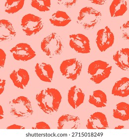 Patrón sin fisuras con estampados de lápiz labial rojo sobre un fondo rosa. Patrón del día de San Valentín del Vector