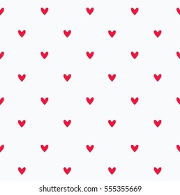 Seamless pattern with red little hearts.