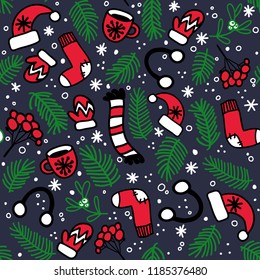 Seamless pattern with red mittens, socks, hats and evergreen branches on dark background. Vector pattern for Christmas, New Year's Day, Winter Holidays. 