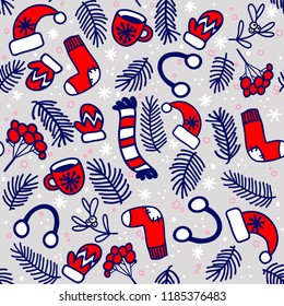 Seamless pattern with red mittens, socks, hats and evergreen branches on gray background. Vector pattern for Christmas, New Year's Day, Winter Holidays. 