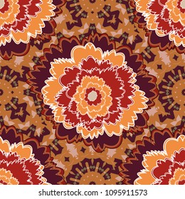 Seamless pattern with red, orange and brown flowers and leaves, abstract floral pattern. Tileable vector pattern for wallpaper, cards or fabric.