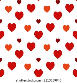 Seamless pattern with red and orange hearts on white background. Vector image.
