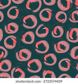 Un patrón sin fisuras con círculos rojos y rosados pintados con pinceladas circulares sobre un fondo oscuro. Perfecto para sus diseños abstractos.