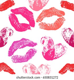 Seamless pattern of red and pink fingerprint hearts and lipstick marks. Romantic pattern for Valentines day or wedding. Vector illustration