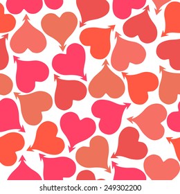 Seamless pattern with red and pink hearts.
