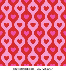 Seamless pattern with red and pink hearts on a pink background. Vector Valentine's day background.