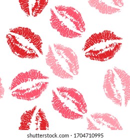 Seamless pattern with a red and pink lipstick kiss prints on a white background. Vector design for textile, backgrounds, clothes, web sites and wallpaper. Fashion illustration seamless pattern.