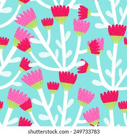 seamless pattern of red and pink tulips on a blue background