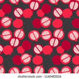 Seamless pattern with red pomegranate. Pomegranate on the dark background with dots. Vector summer pattern with pomegranates. Fruit repeated background. Simple repeated background perfect for fabric