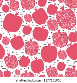 Seamless pattern of red pomegranate.Hand drawn fruits.To be use for textile design clothes,wrapping paper,wallpaper for children room.white background with granet.Summer backdrop.Red nature shapes.