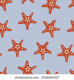 Seamless pattern with red starfish on a blue background. Sea, ocean, body of water. Living organism, marine life. Vector illustration