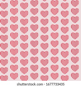 Patrón sin problemas con los corazones rayados rojos