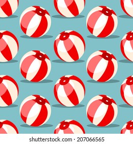 Seamless pattern with red and white beach balls