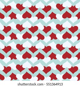 Seamless pattern with red and white hearts over blue background.