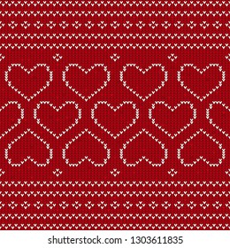 Seamless pattern red and white knitted background with hearts. Knitted pattern on a red background. Ornament. Valentine's Day background. Sweater texture hearts seamless