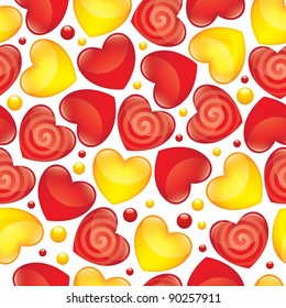 seamless pattern with red and yellow glossy hearts