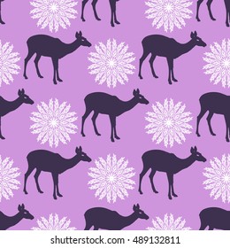 Seamless  pattern with reindeer. Pink Background with deers and snowflake.Vector illustration.