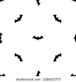 Seamless pattern of repeated black bat symbols. Elements are evenly spaced and some are rotated. Vector illustration on white background