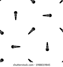 Seamless pattern of repeated black microphone symbols. Elements are evenly spaced and some are rotated. Vector illustration on white background