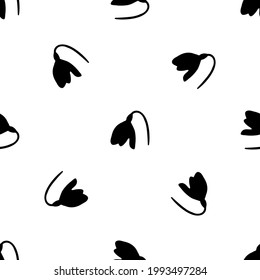 Seamless pattern of repeated black snowdrops. Elements are evenly spaced and some are rotated. Vector illustration on white background