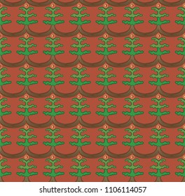 seamless pattern with repeated christmas trees on a red fond