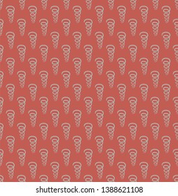 seamless pattern with repeated spirals on a red fond