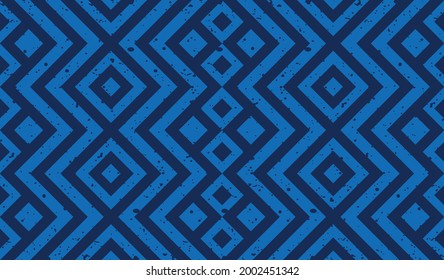 Seamless pattern repeating design with geometric shapes.