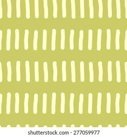 Seamless pattern with repeating elements freehand drawing vertical short rods similar to the worms in a row facing a light yellow to dark mustard yellow background