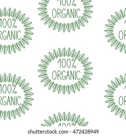 Seamless pattern with repeating green colored sprout on green lettering 100% organic isolated