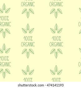 Seamless pattern with repeating green colored sprout on green lettering 100% organic 