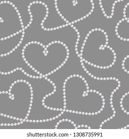 Seamless pattern. Repeating Pearl necklace. Chains of white pearls forming an ornament. Realistic strands of white pearls, decorative element for cards, wedding invitations. Threads of pearls