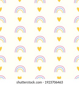 Seamless pattern with repeating rainbow and hearts in pastel colors.