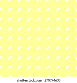 Seamless pattern of repeating rectangle with strongly rounded edges on a yellow background and white
