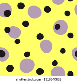 Seamless pattern with repeating round spots. Irregular polka dot. Yellow, purple, black. Simple vector illustration.