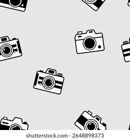 Padrão contínuo de câmeras preto e branco retro em cinza claro, ideal para fãs de fotografia, temas vintage, scrapbooking, embalagem ou design de tecido
