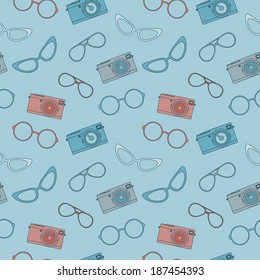 Seamless pattern with retro camera and glasses