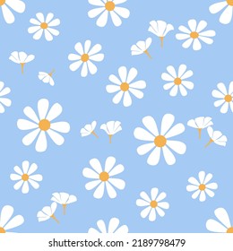 Seamless pattern with retro daisy flower on blue background vector illustration. Cute floral print.