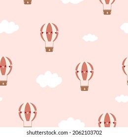 Seamless pattern with retro pink air balloon and clouds on pink background for wrapping paper, background, greeting card