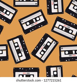 Seamless pattern in retro style with audio cassettes