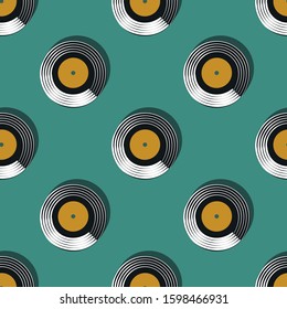 Seamless pattern in retro style with yellow vinyl records on a blue background. Textiles, covers, background, wallpaper, wrapping paper, case 