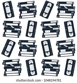 Seamless pattern with retro video cassettes. Vector illustration.