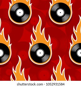 Seamless pattern with retro vintage vinyl record icons and flames. Vector illustration. Ideal for wallpaper, covers, wrapper, packaging, fabric design and any kind of decoration.