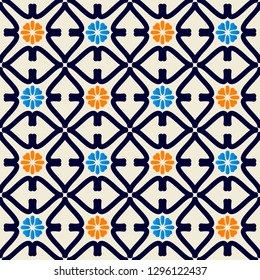 Seamless pattern with rhombuses and colorful flowers.