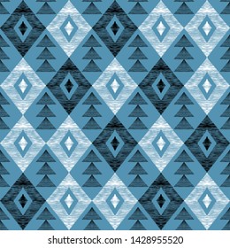 Seamless pattern of rhombuses and triangles. Pattern in the style of ethno. Rhombus and hand-shaded triangles.