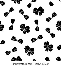 Seamless pattern of ribbons silhouettes. Bows. Suitable for fabric, wrapping paper.