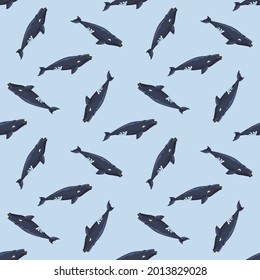 Seamless pattern right whale on light blue background. Template of cartoon character of ocean for fabric.Repeated random texture with marine cetacean.Design for any purposes.Vector illustration